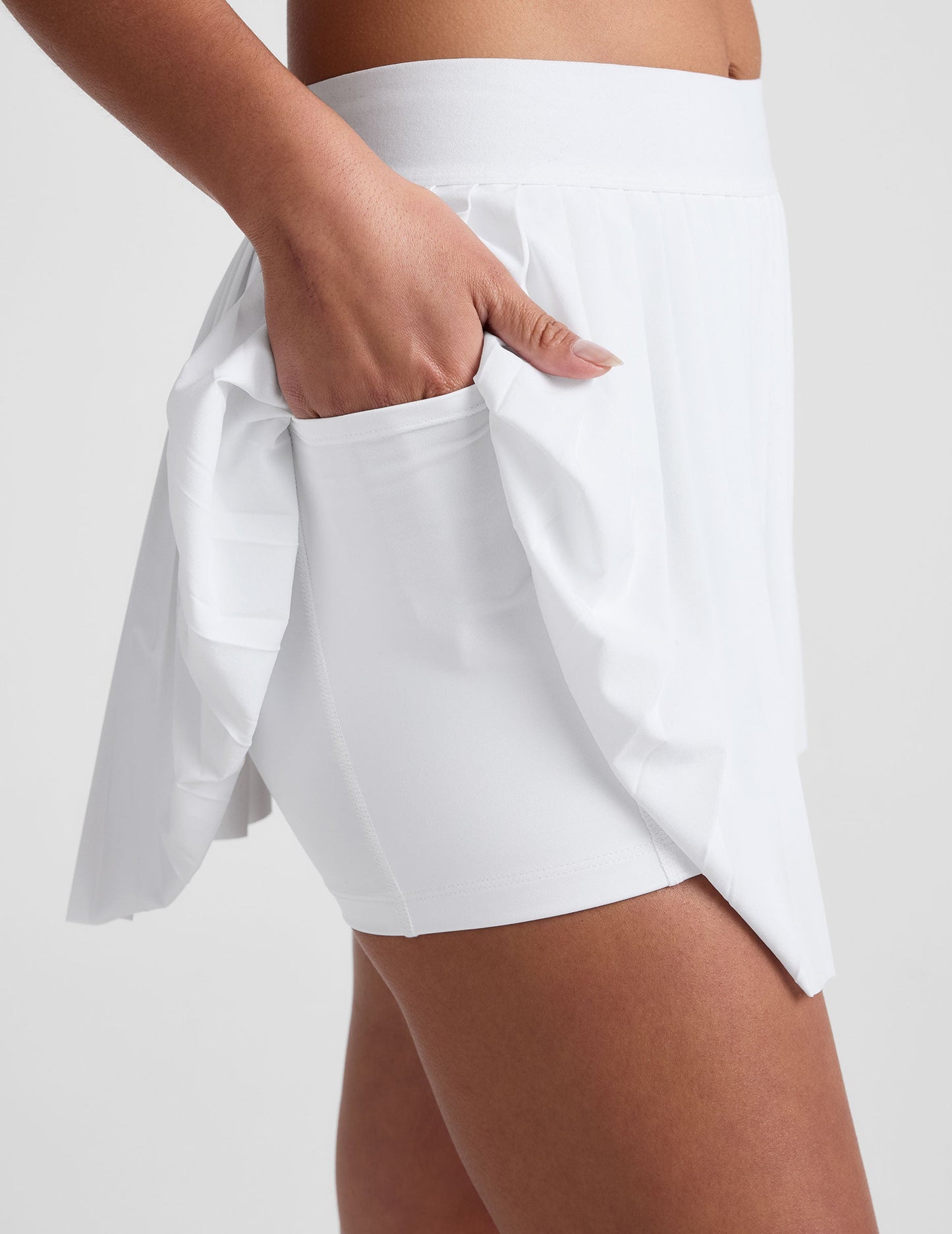 Women's Pleated Active Mini Skirt with Built-in Shorts and Pockets