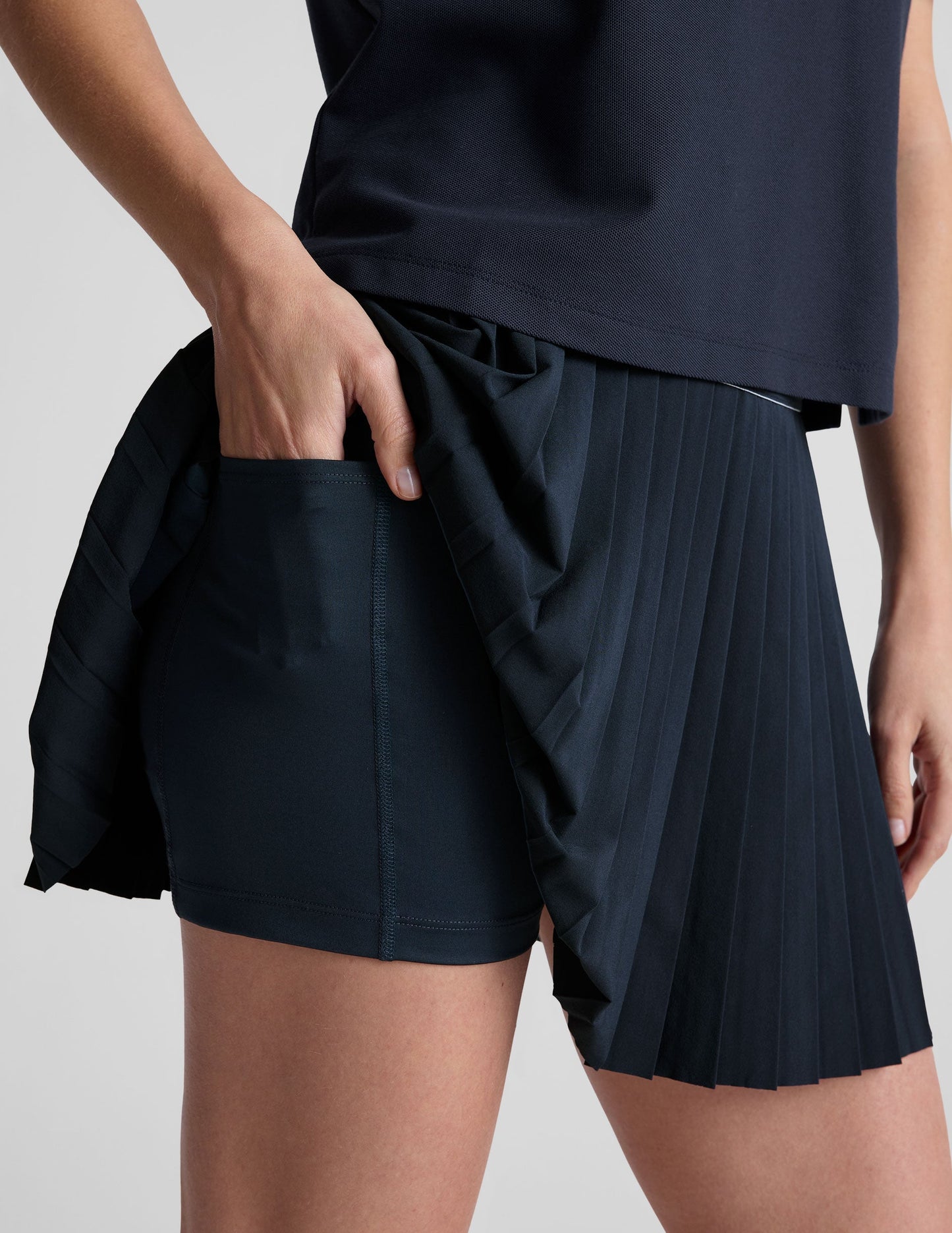 Pleated Performance Mini Skirt with Pockets & Striped Elastic Waistband