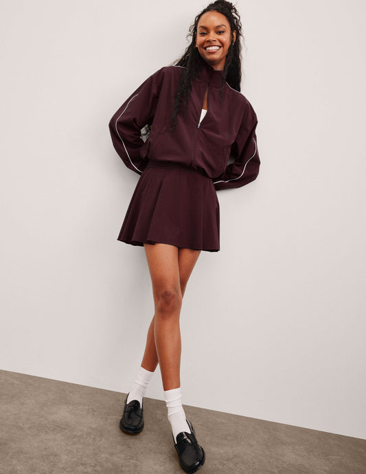 Active Pleated Mini Skirt with Integrated Shorts & Pockets - Sporty Style