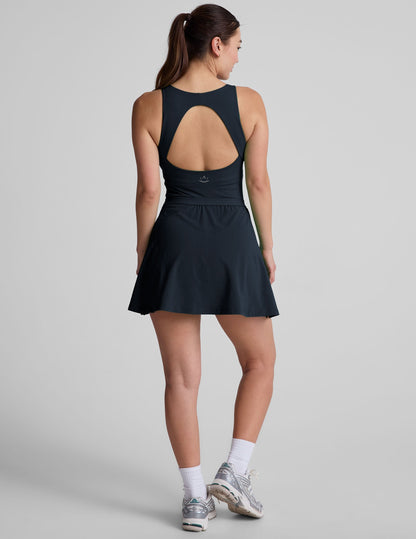 Active Pleated Mini Dress: Built-in Shorts, Pockets, Open Back Design