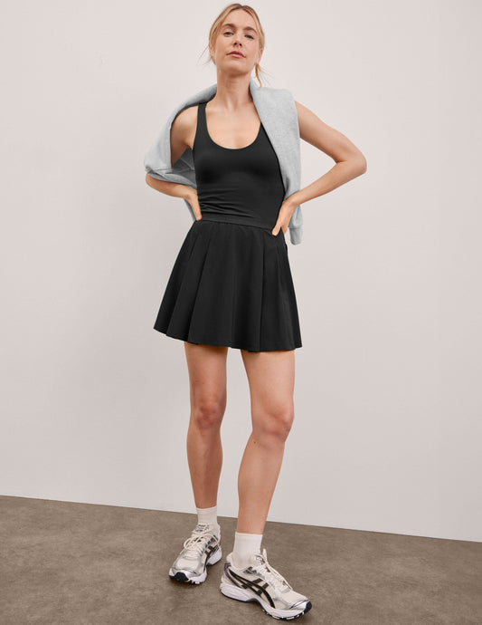 Performance Pleated Mini Dress with Built-in Shorts, Pockets, Open Back